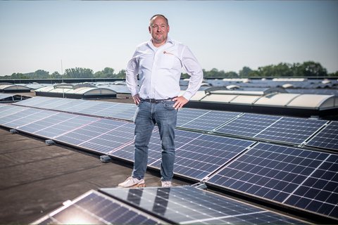 Nils Neugebauer, Sales Photovoltaics, on the roof of our logistics centre.